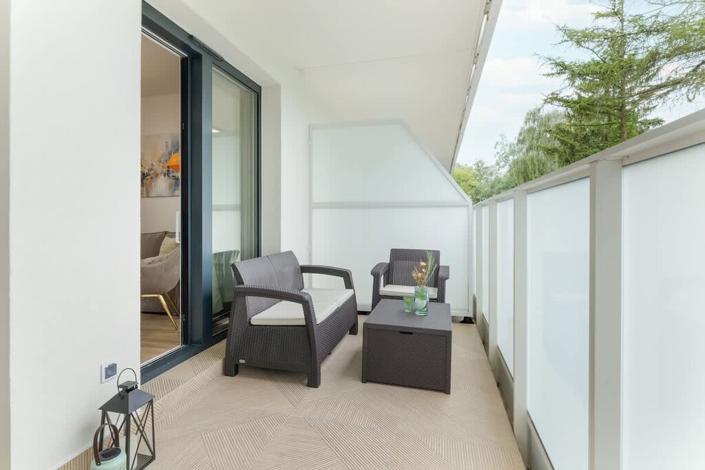 Balcony with garden furniture - the perfect place to sip your morning coffee or relax.