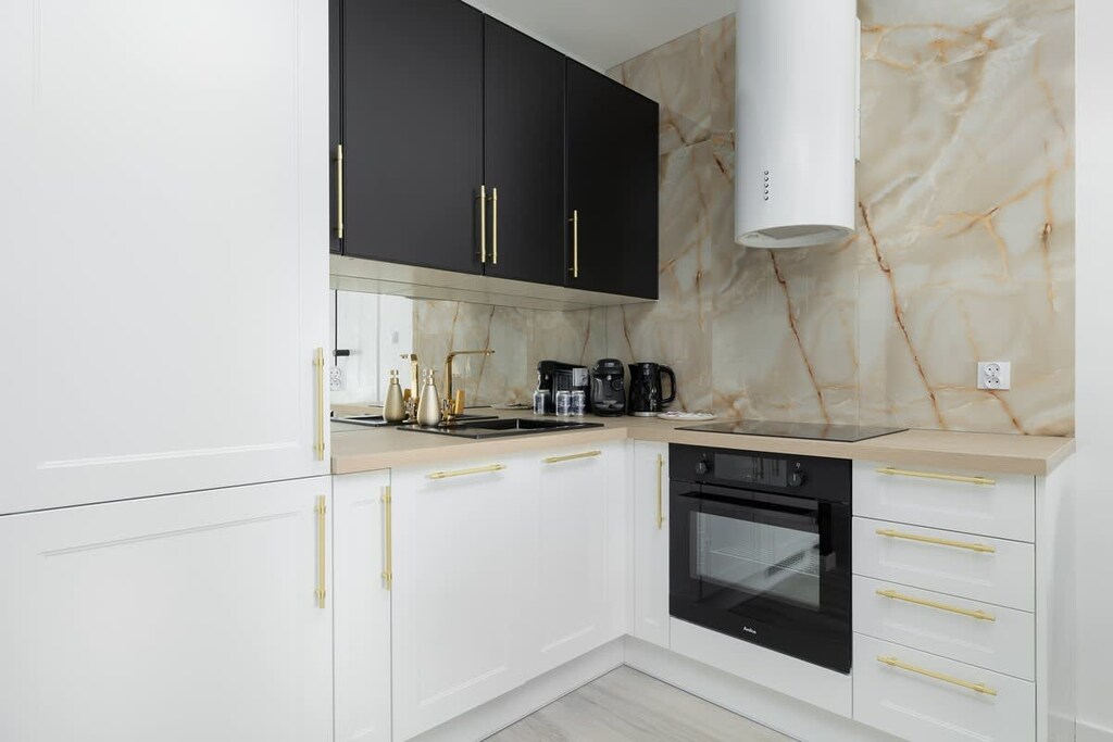 The fully equipped kitchenette includes everything you need for a home-cooked meal.