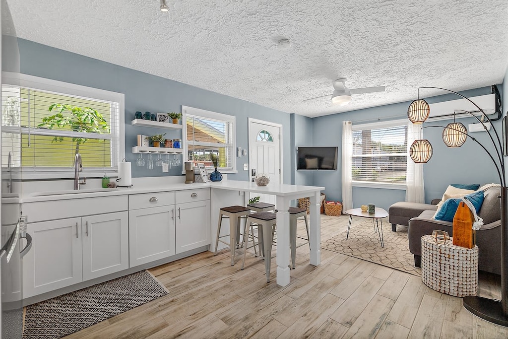 Cozy open concept design with everything you'll need to relax after a day at the beach or exploring the Historic District!