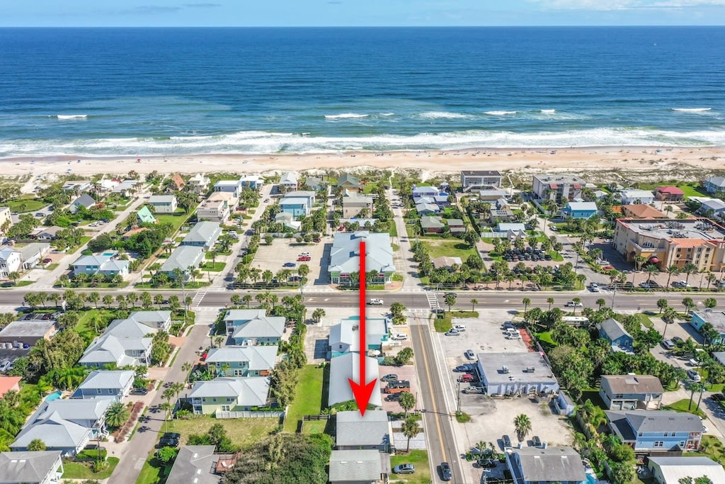 A short walk up the street and you can walk over the dune to our beautiful white sandy beach!