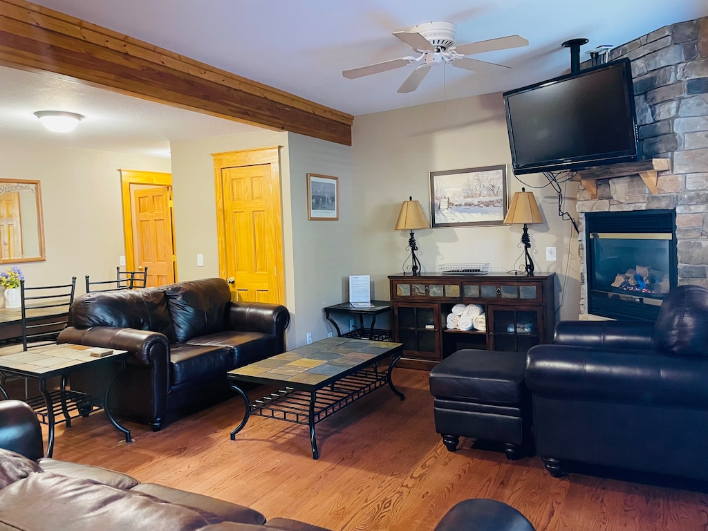 Open concept living room adjacent to kitchen.