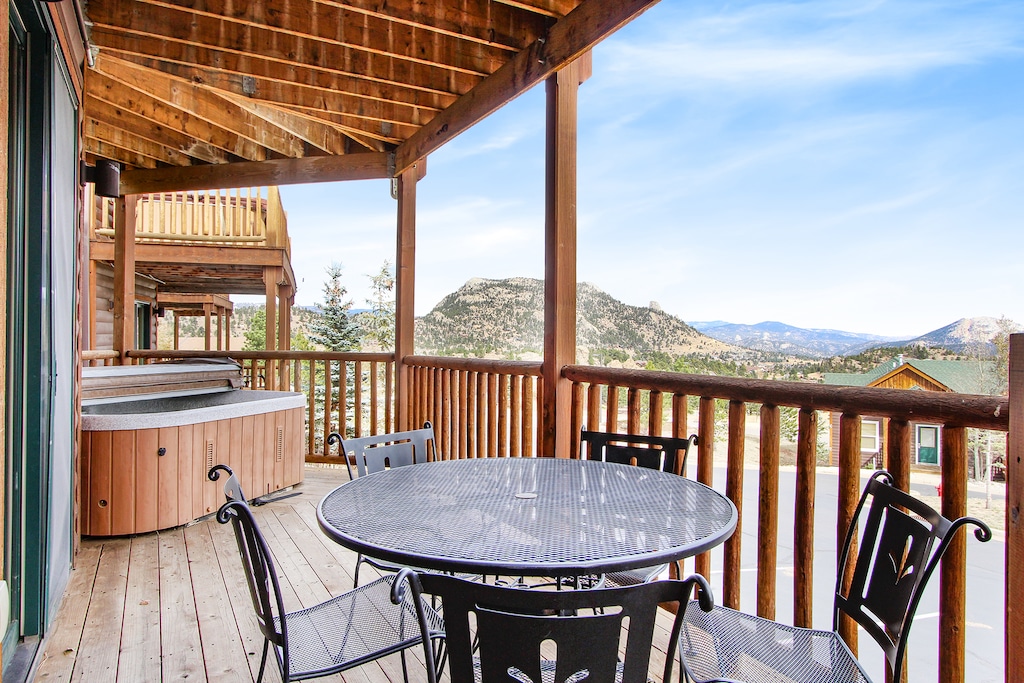 Large deck with your own hot tub and outdoor dining area. 