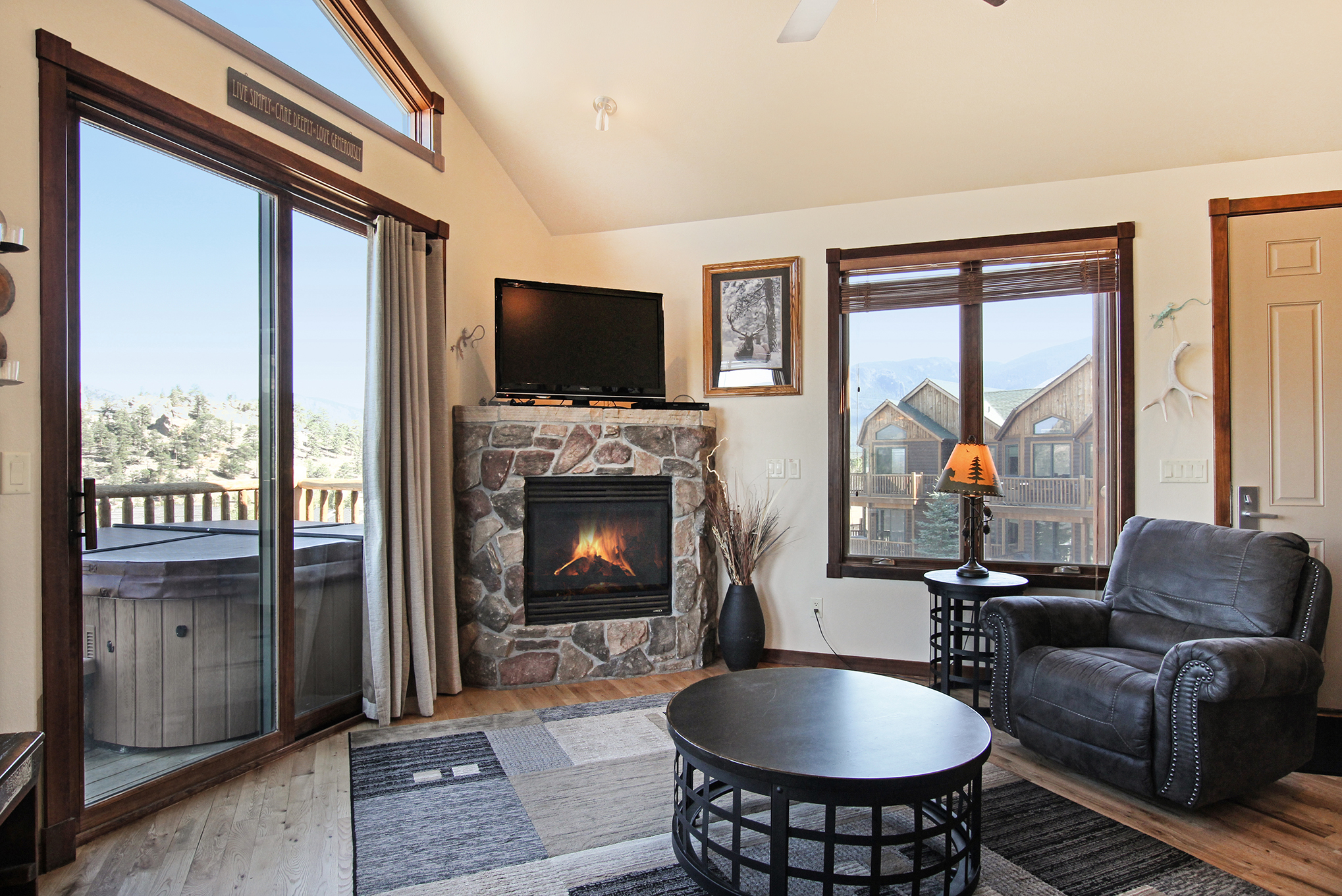 Cozy up to the gas fireplace in the comfy recliner and enjoy the flat screen TV or mountain views. 