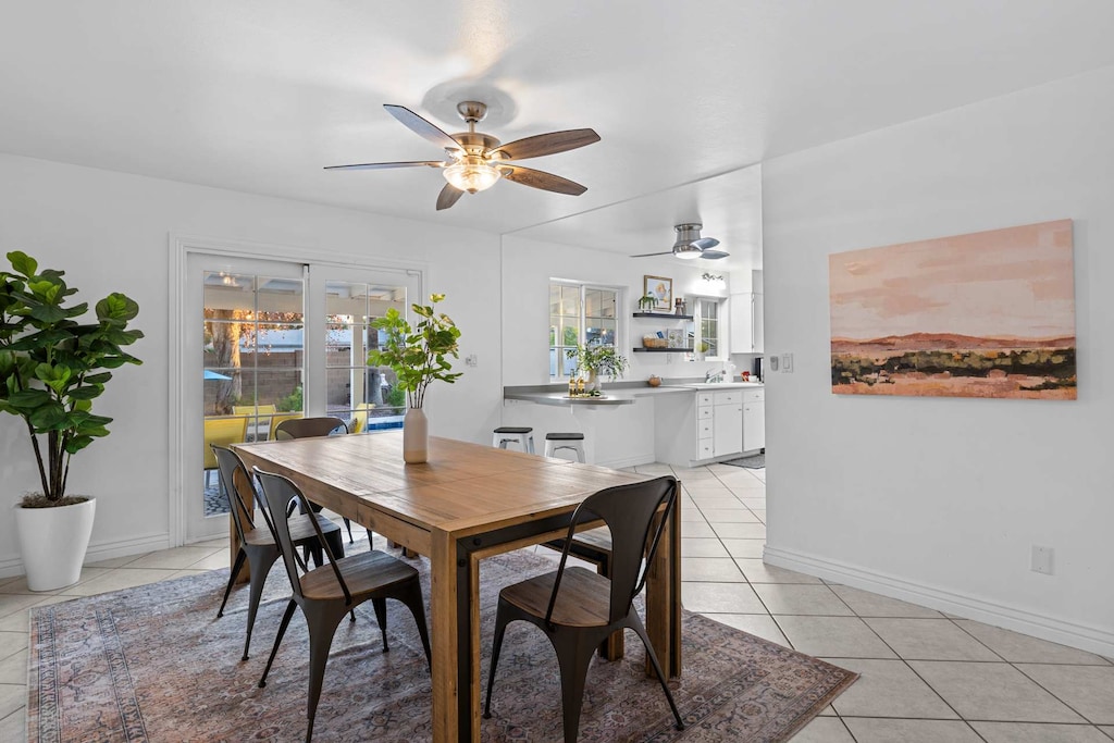 Dining room walks out to the patio, overlooks the pool.