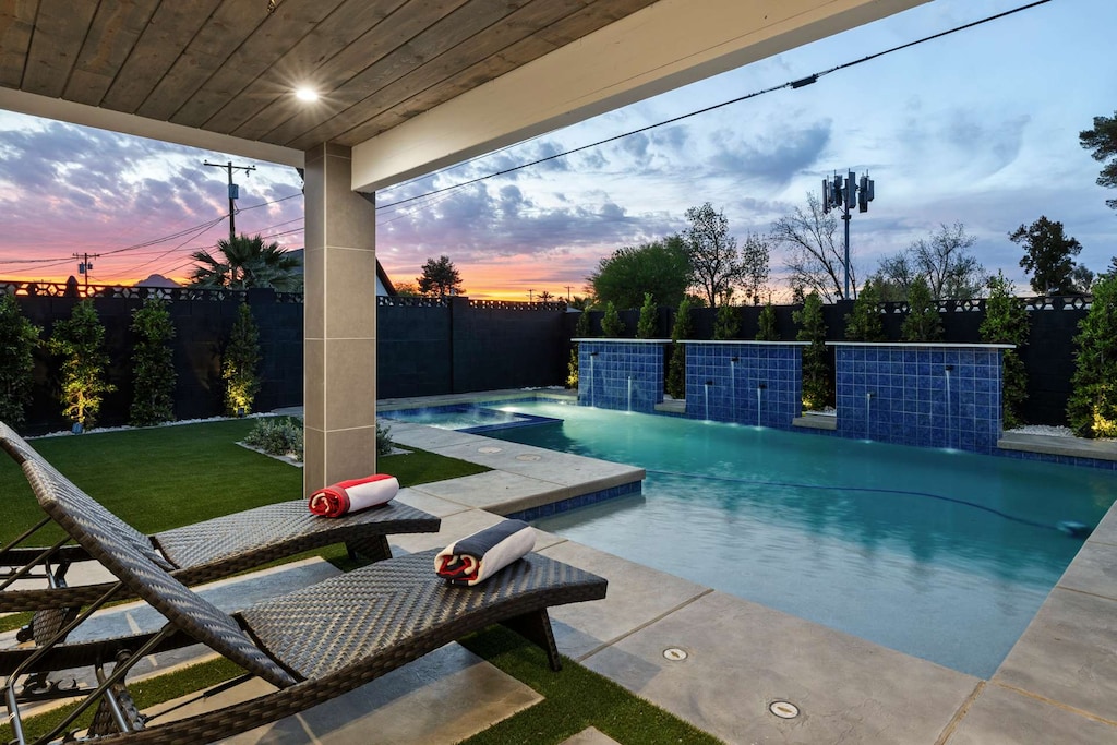 Sunset views and serene waters, the perfect backdrop for peaceful poolside relaxation.