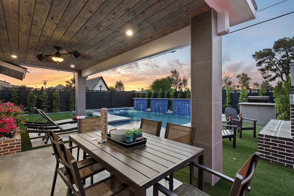 Savor moments by the poolside with lush views and stylish seating.