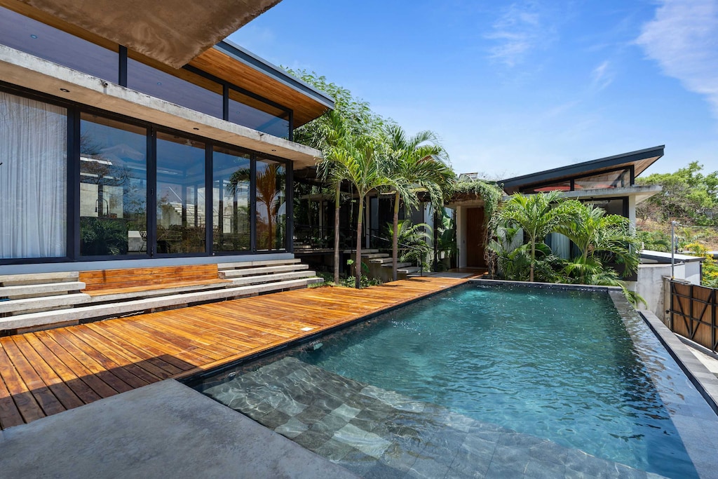 Dip into delight. Your tropical escape flows.

