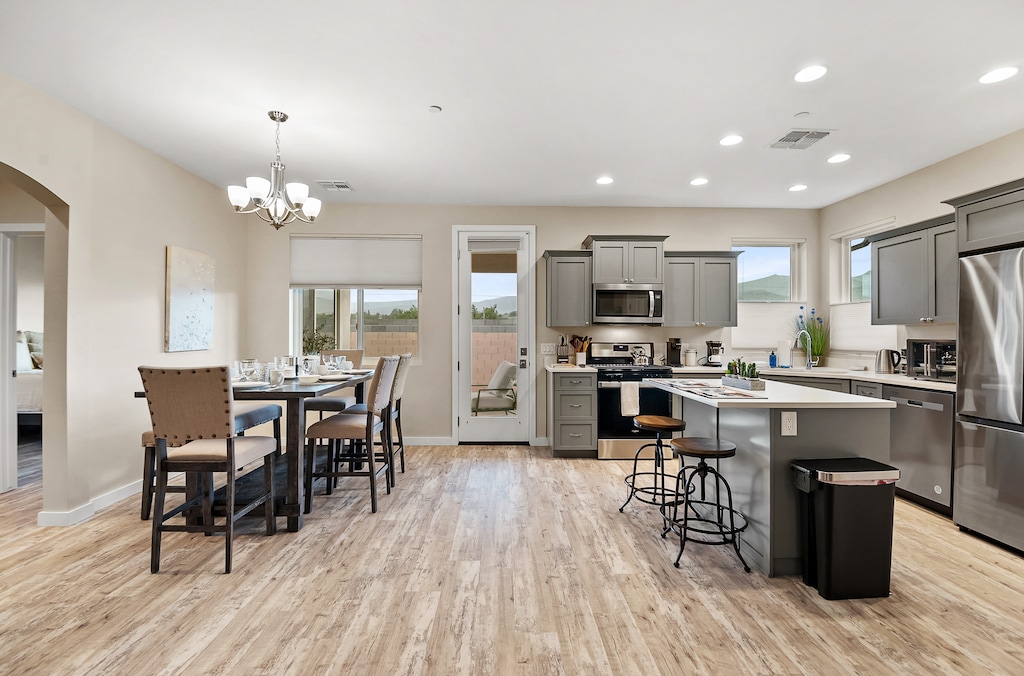 Dining and Kitchen space with access to backyard