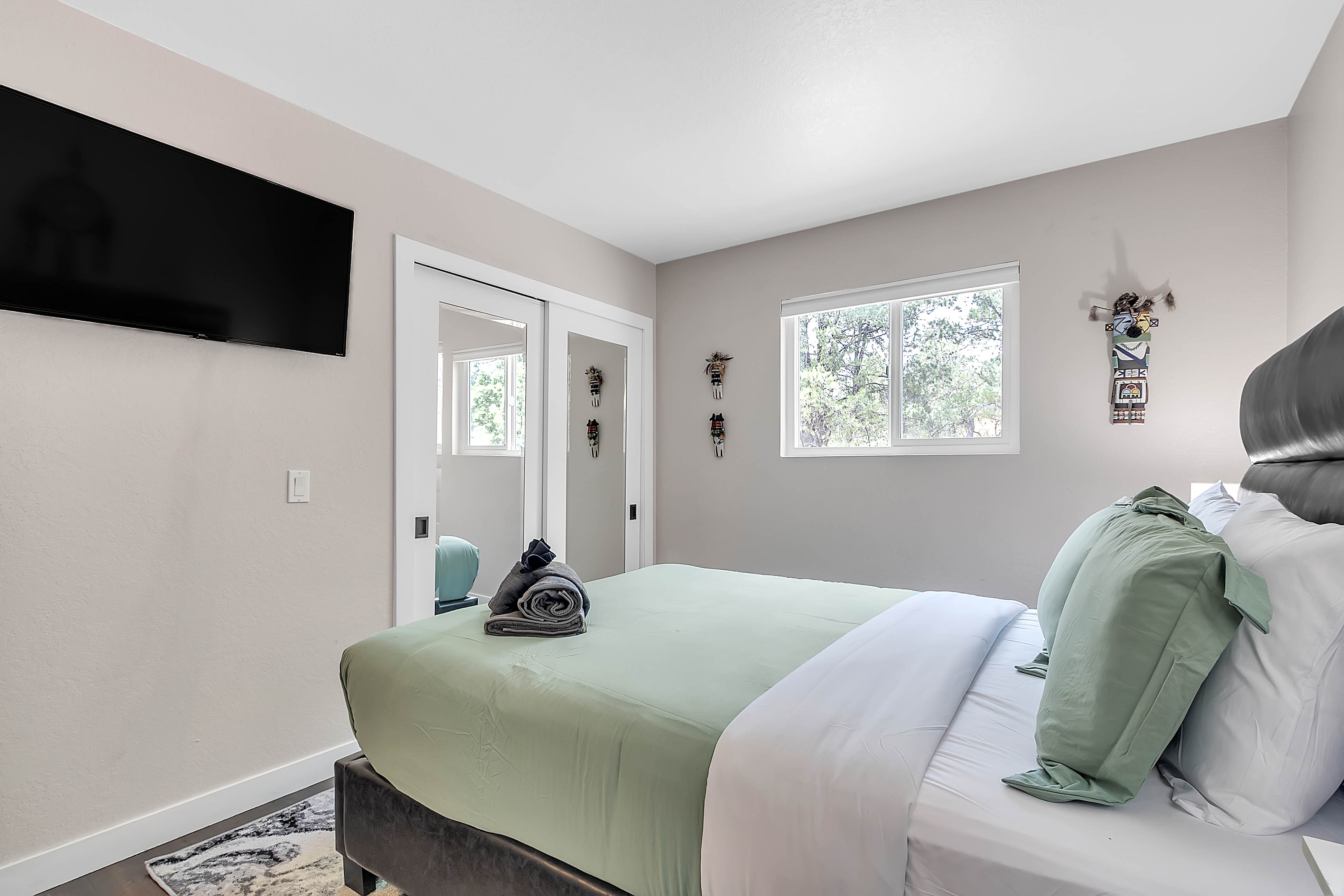 Bedroom 2 (Main Level) — Queen bed, Smart TV