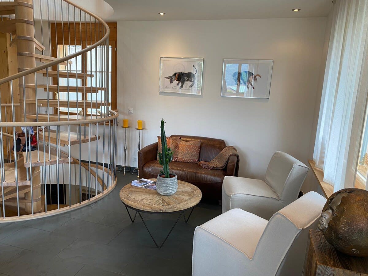 sitting area near beautiful staircase 