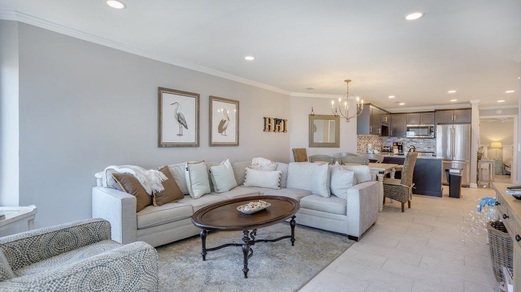 Plush seating makes it a welcoming spot to relax after a beach day—perfect for morning coffee, movie nights, or simply unwinding while taking in the view.