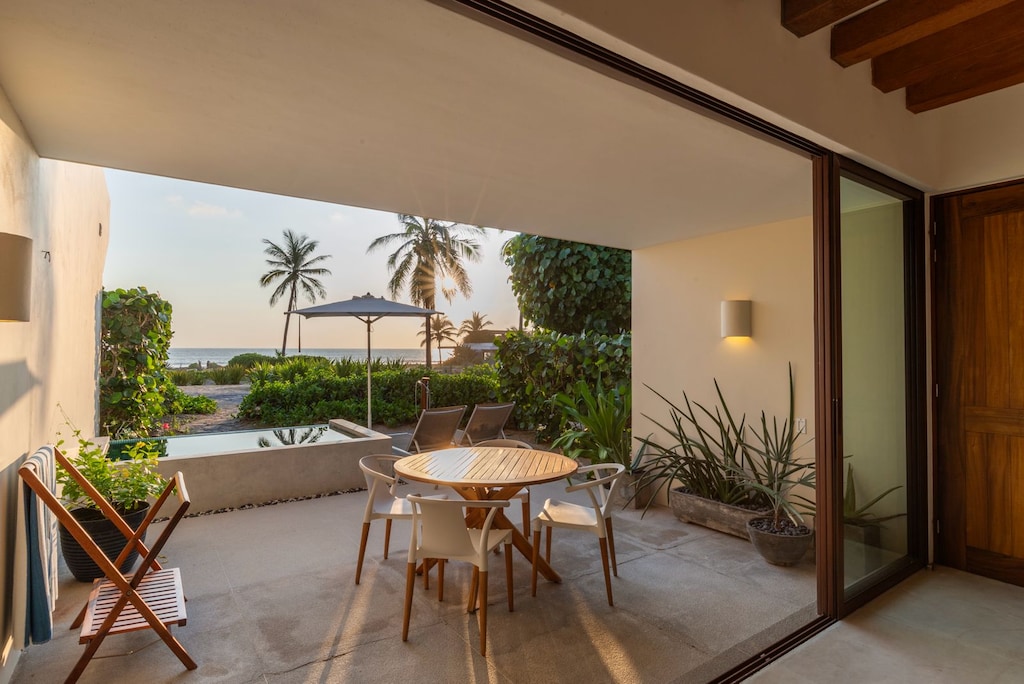 Enjoy breathtaking ocean views from this spacious outdoor patio, perfect for relaxation or al fresco dining.