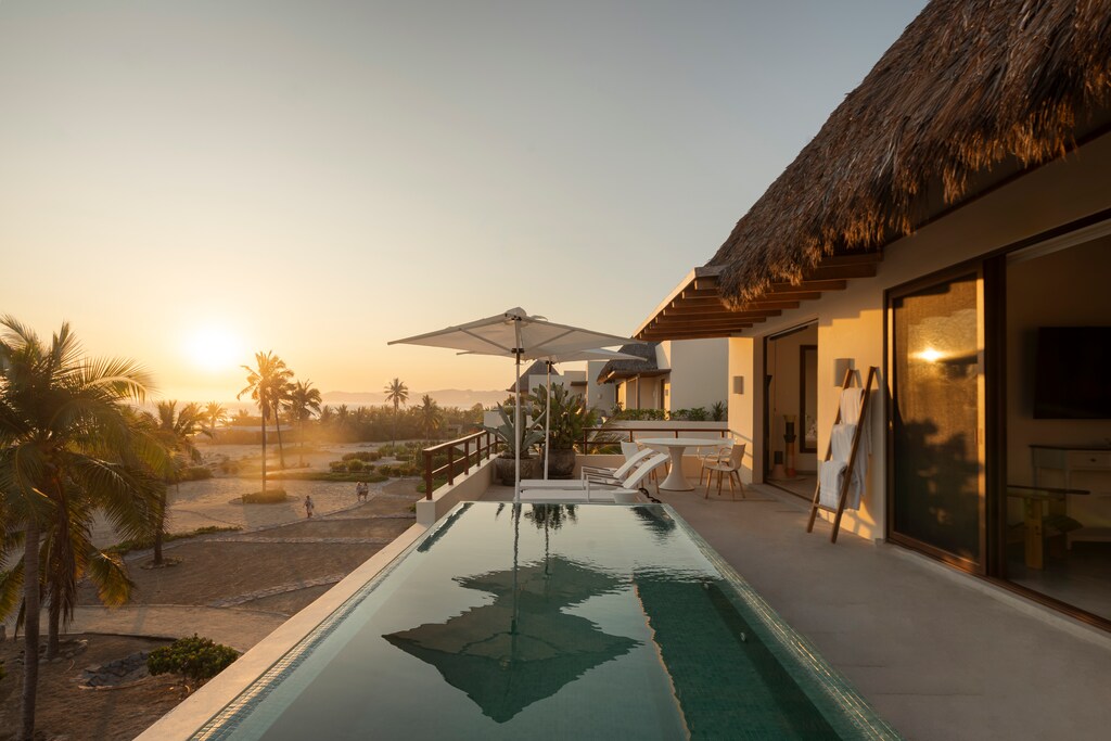 Unwind in your exclusive rooftop pool while soaking in stunning panoramic ocean and resort views.