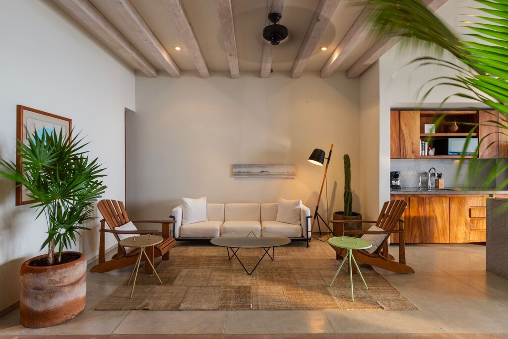 A cozy yet elegant living space featuring warm wood tones, modern furniture, and an inviting atmosphere.