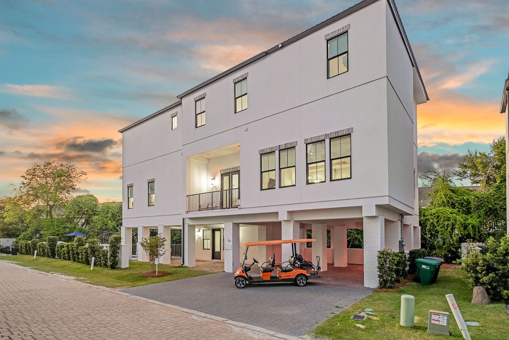 This home is surrounded by vibrant, tropical serenity.