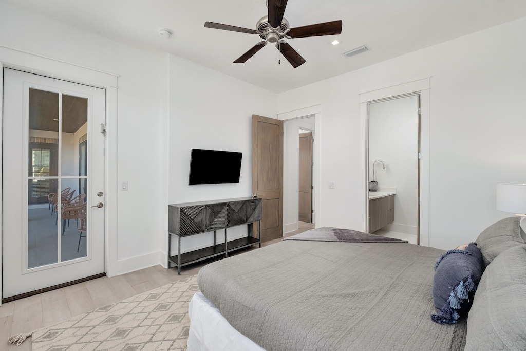 Bedroom #5 has access to the front balcony.