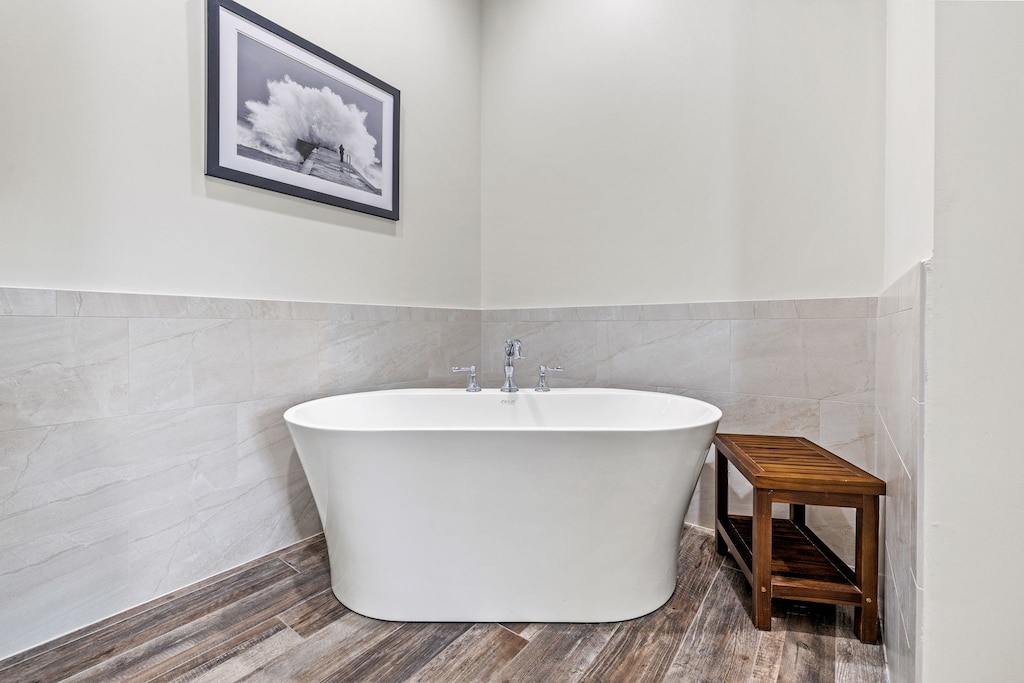 Private bathroom #3 also includes a free-standing soaking tub.