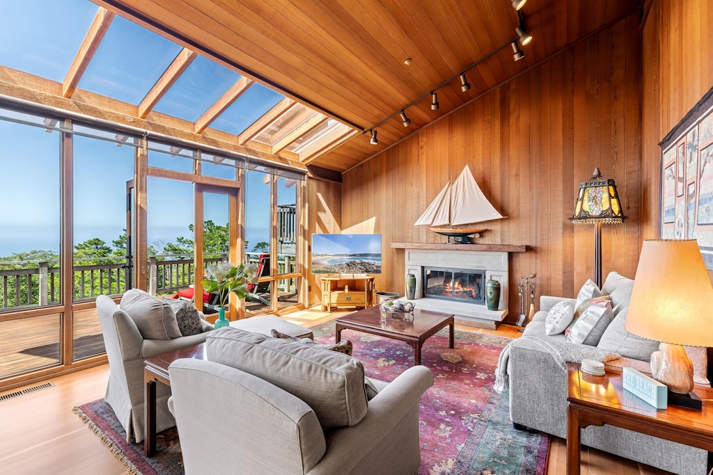 Ocean View Living Room, Wood Burning Fireplace, TV
