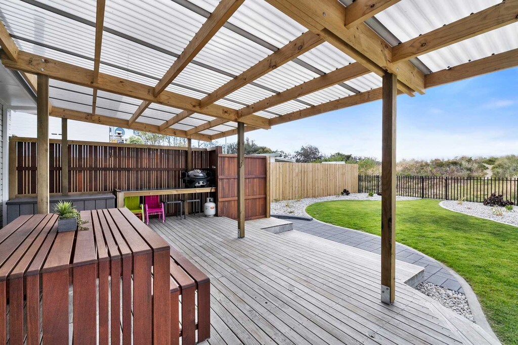 Large under cover deck  with outside dining  and BBQ 