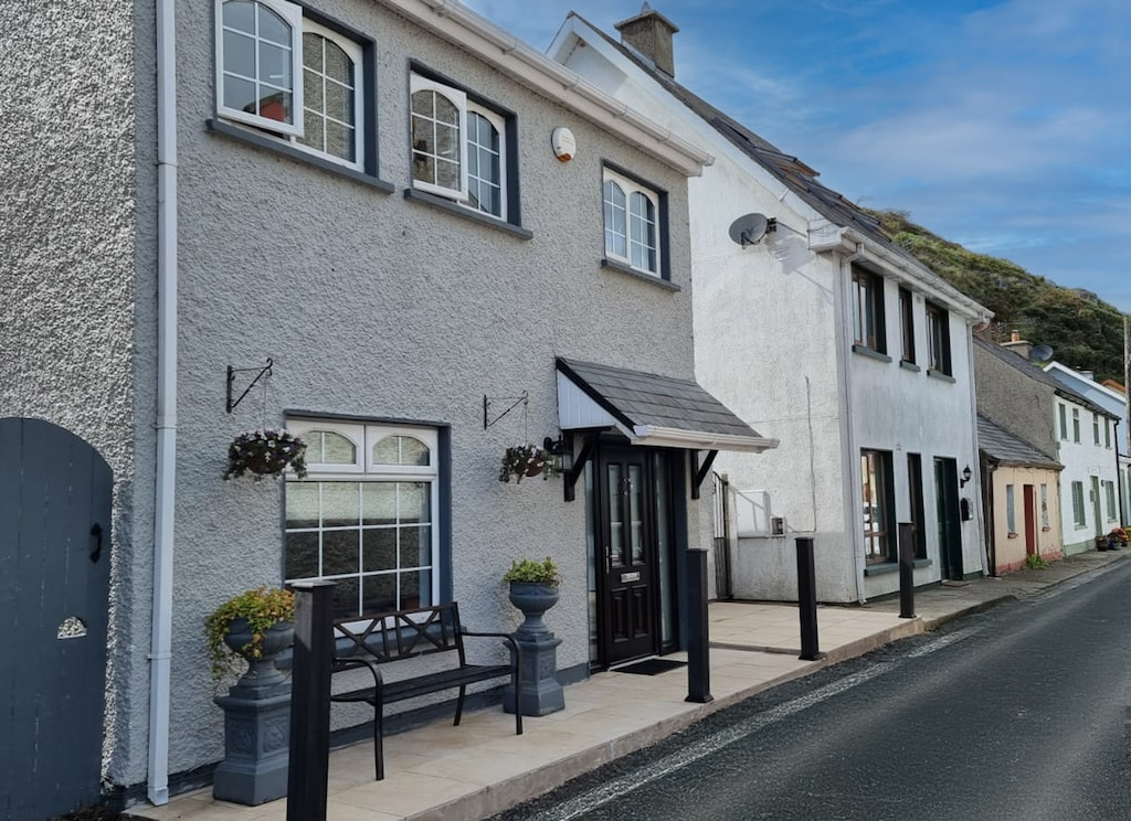 Passage East, Co Waterford. Family holiday home, opens onto street. Close to ferry. Within village all facilities and walking distance to ferry. 