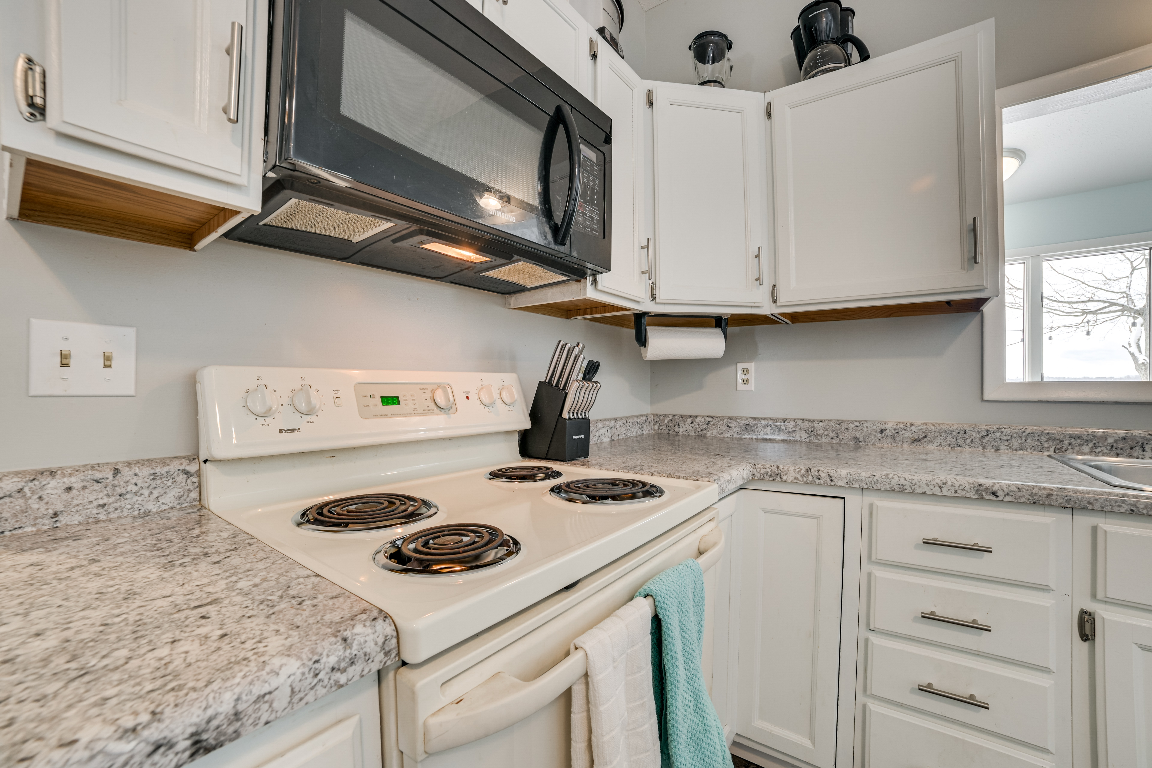 Dock & Views: Lake Mitchell Home in Cadillac!