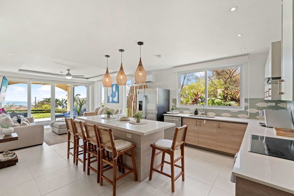 Gather, gaze, and live the Esmara coastal dream.

