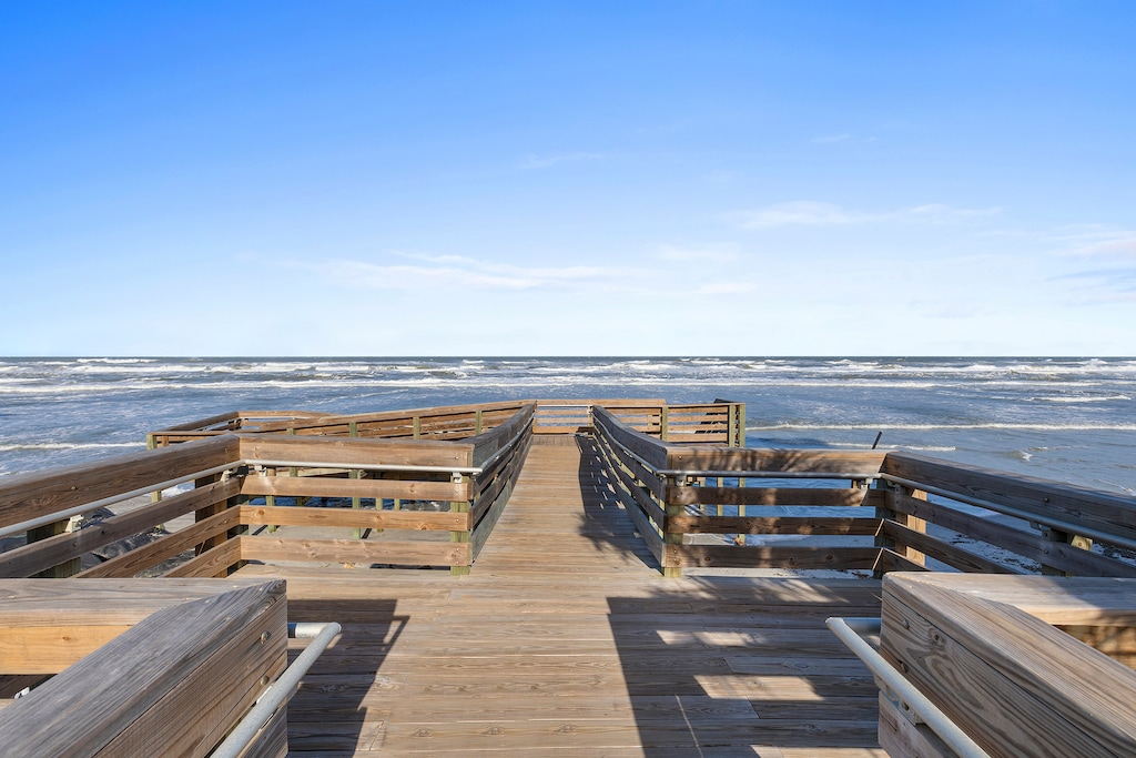 Walkway to beach next to complex