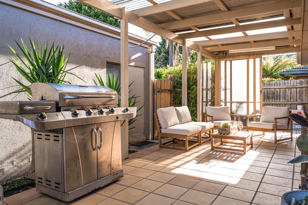 BBQ grill and outdoor furniture 
