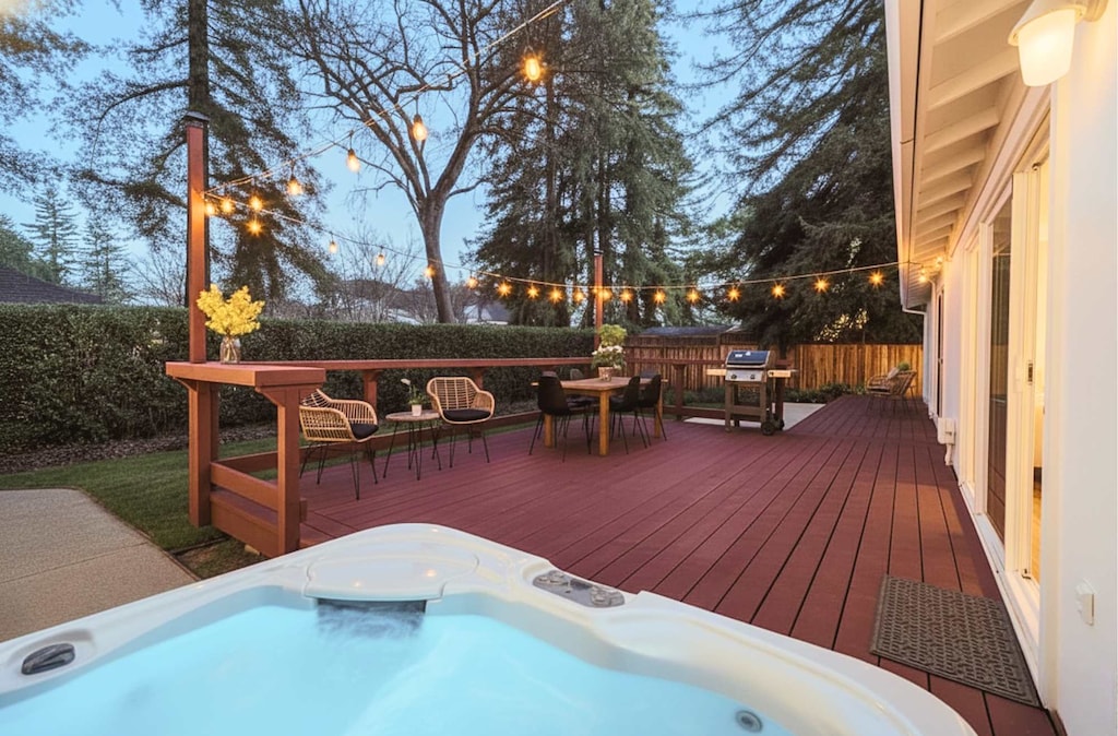 Relax and enjoy on the spacious patio and unwind in the hot tub—perfect for family time or evenings with friends.