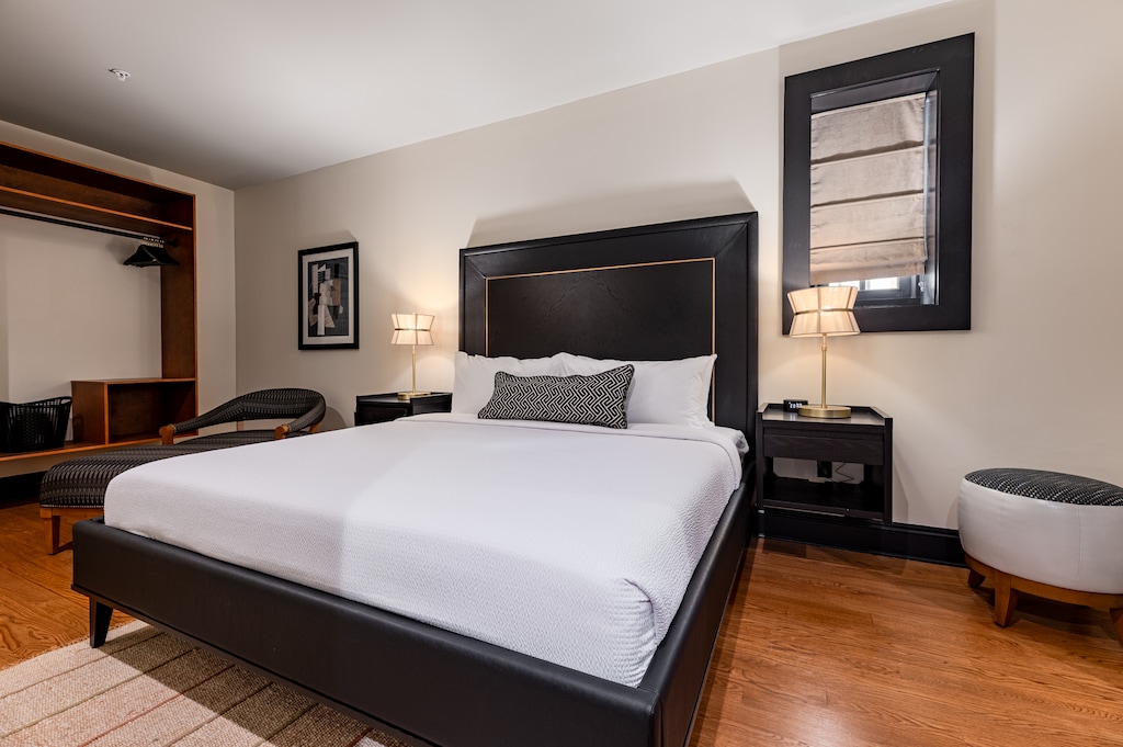Bedroom 2 - King bed featuring a built-in wardrobe and flat-screen TV.