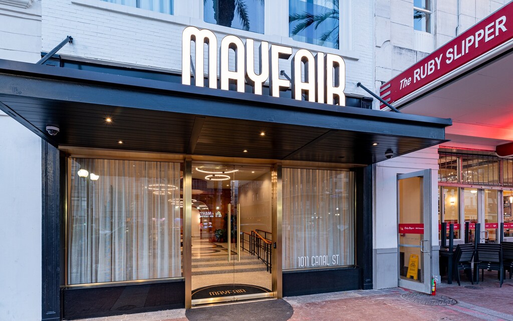 The Mayfair's sleek, modern storefront, conveniently located next to The Ruby Slipper Café on Canal Street.