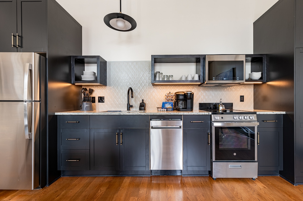 Kitchen 1 - Fully equipped kitchen with modern appliances, offering everything you need for preparing meals or enjoying a morning coffee.