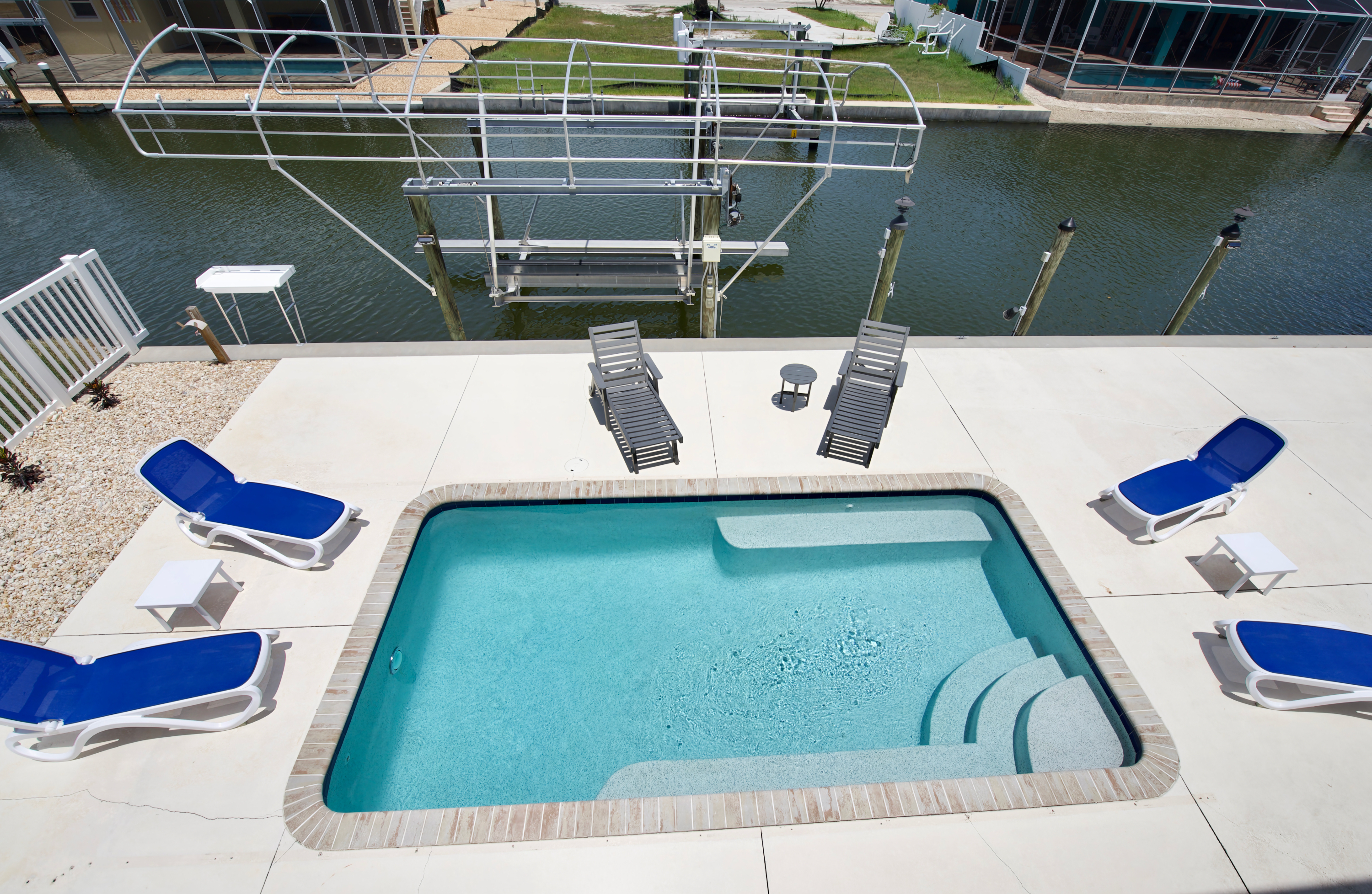 Aerial view of pool and dock area