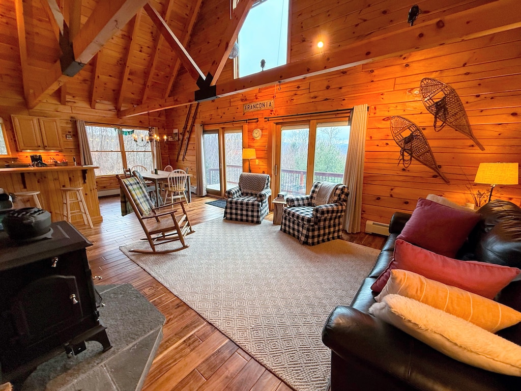 This bright open-concept living room offers plenty of natural sunlight.