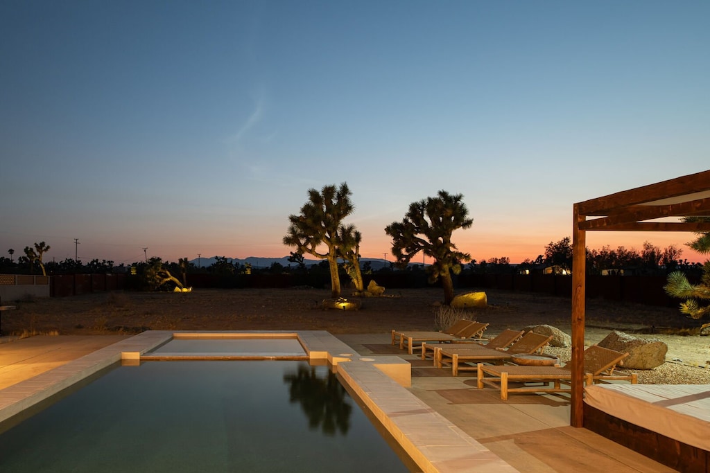 Take in the magical sunset at Sand.