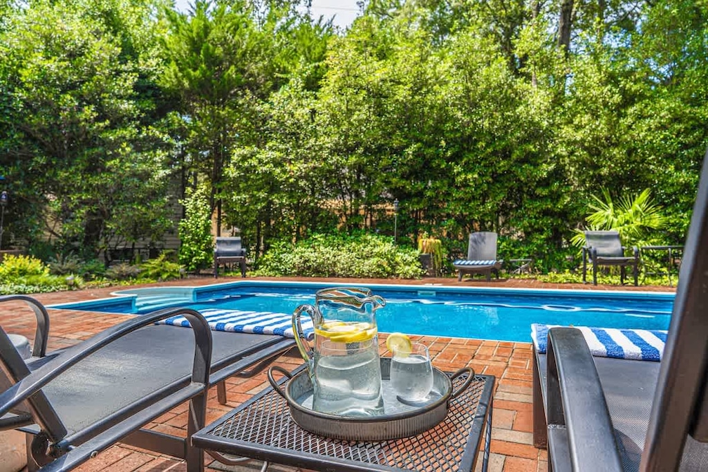 Enjoy a refreshing drink overlooking our private pool