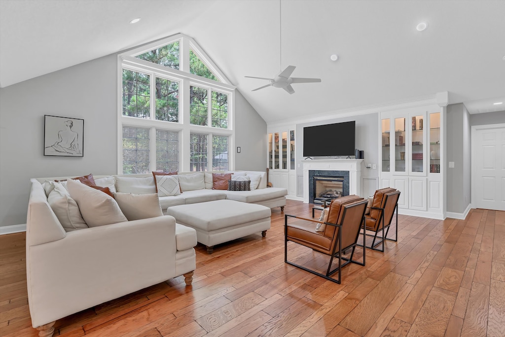 Spacious living room, comfortable and inviting gathering space to relax, reconnect, or catch the game (fireplace inoperable).