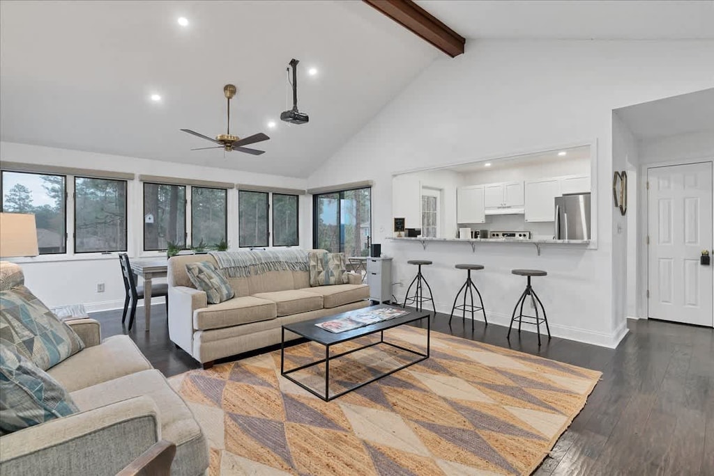 Inviting and open living space with full screen projector