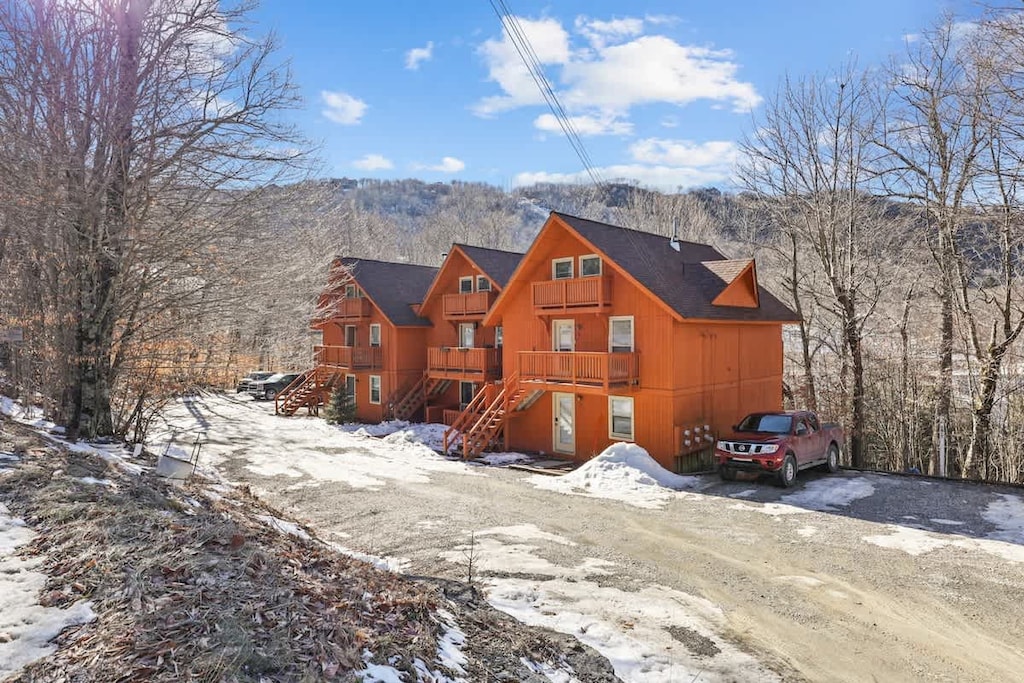 Behold the captivating outside view of the condo, where charm meets comfort, creating an enchanting facade for a welcoming stay.