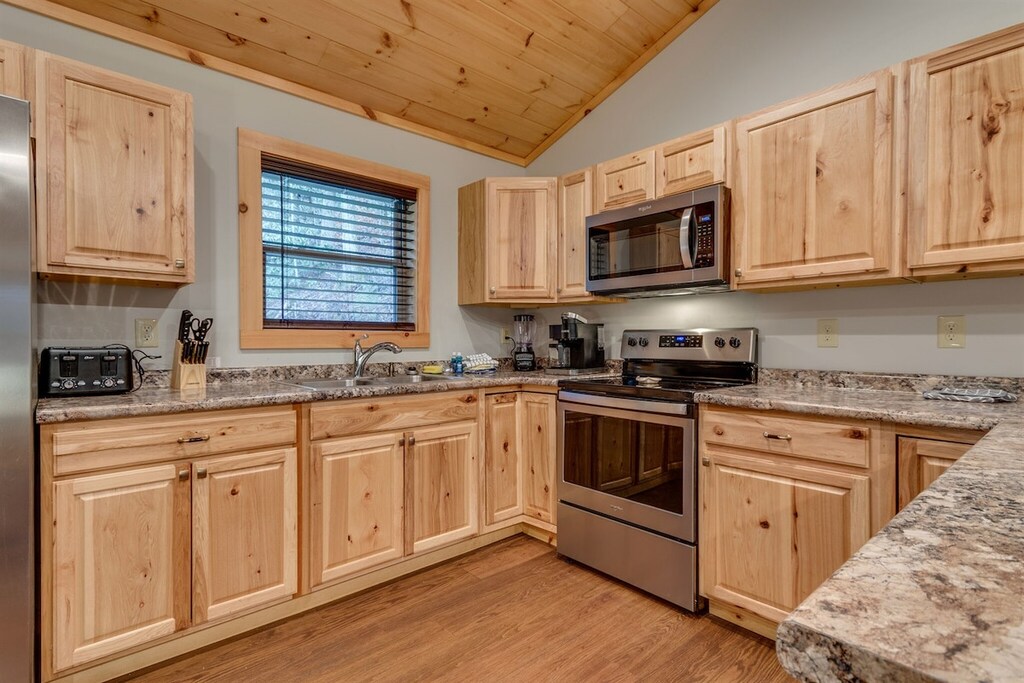 Fully stocked kitchen with all the essential utensils, pots, pans, and cookware needed for easy meals during your stay.