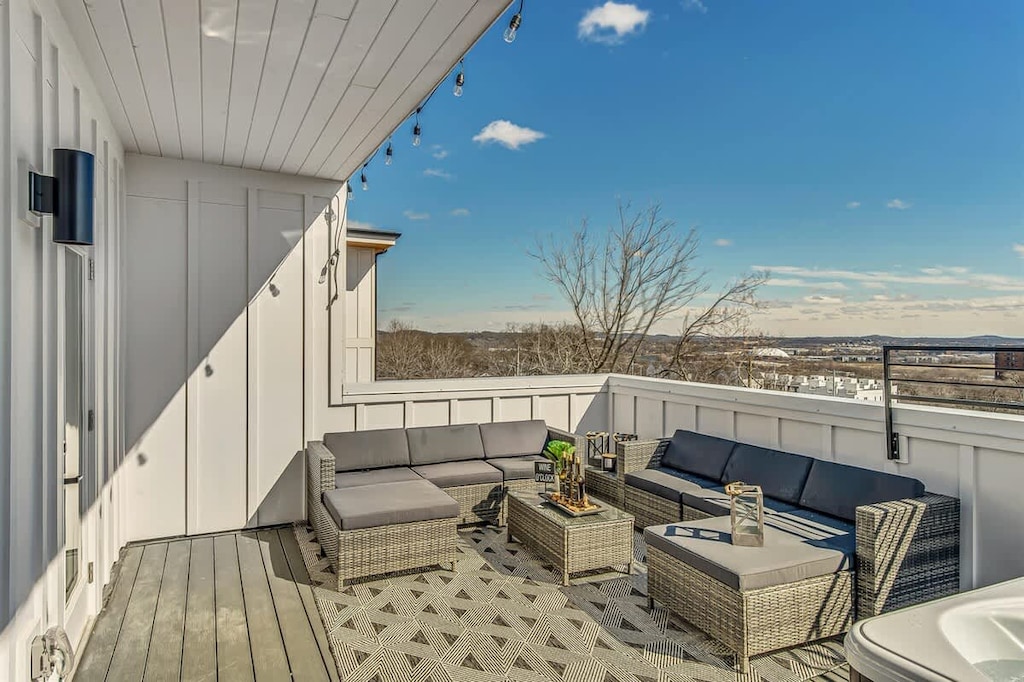 Spacious rooftop with skyline views and relaxing hot tub!