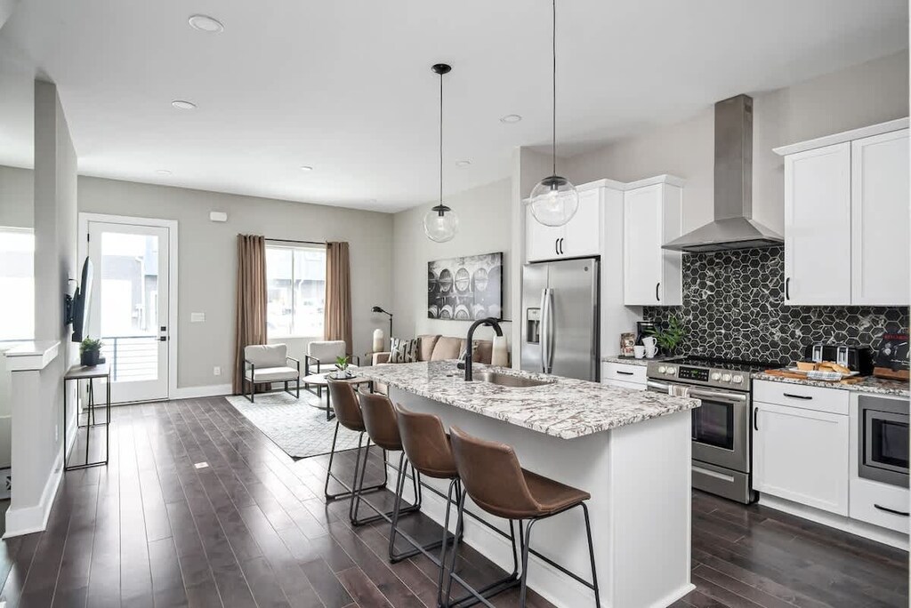 Cook up a storm in this stylish kitchen with modern finishes and ample seating!