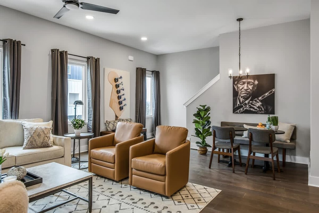 Contemporary open-concept design uniting living and dining areas.