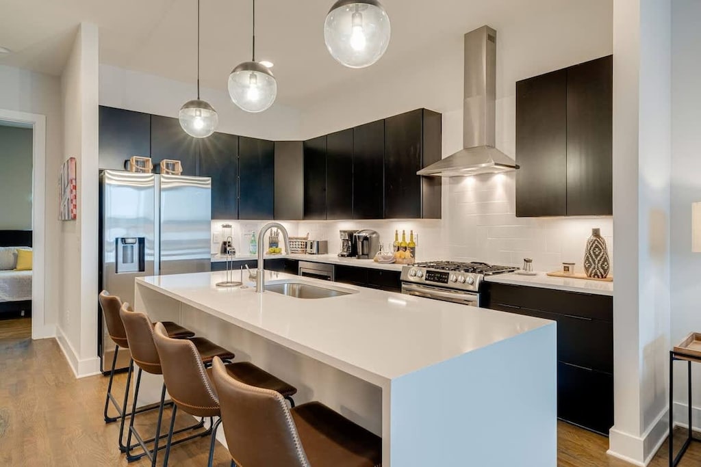 Whip up delicious meals in this sleek, modern gourmet kitchen!