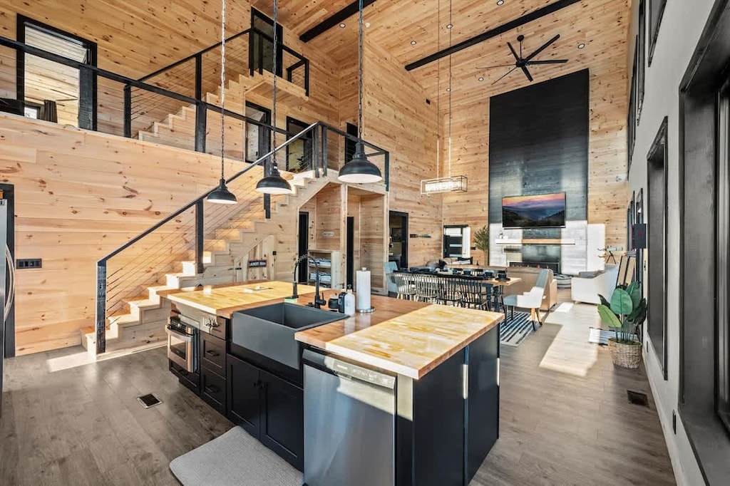 Modern, spacious home with an open kitchen, living, and dining area.