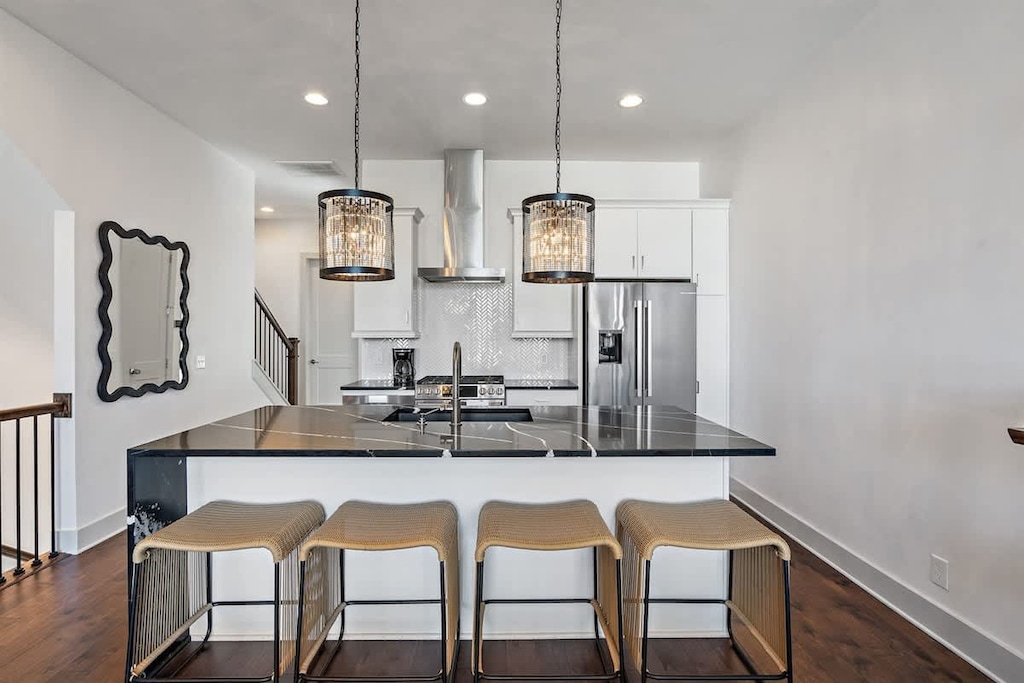 Sleek and modern kitchen space, perfect for cooking and connection!