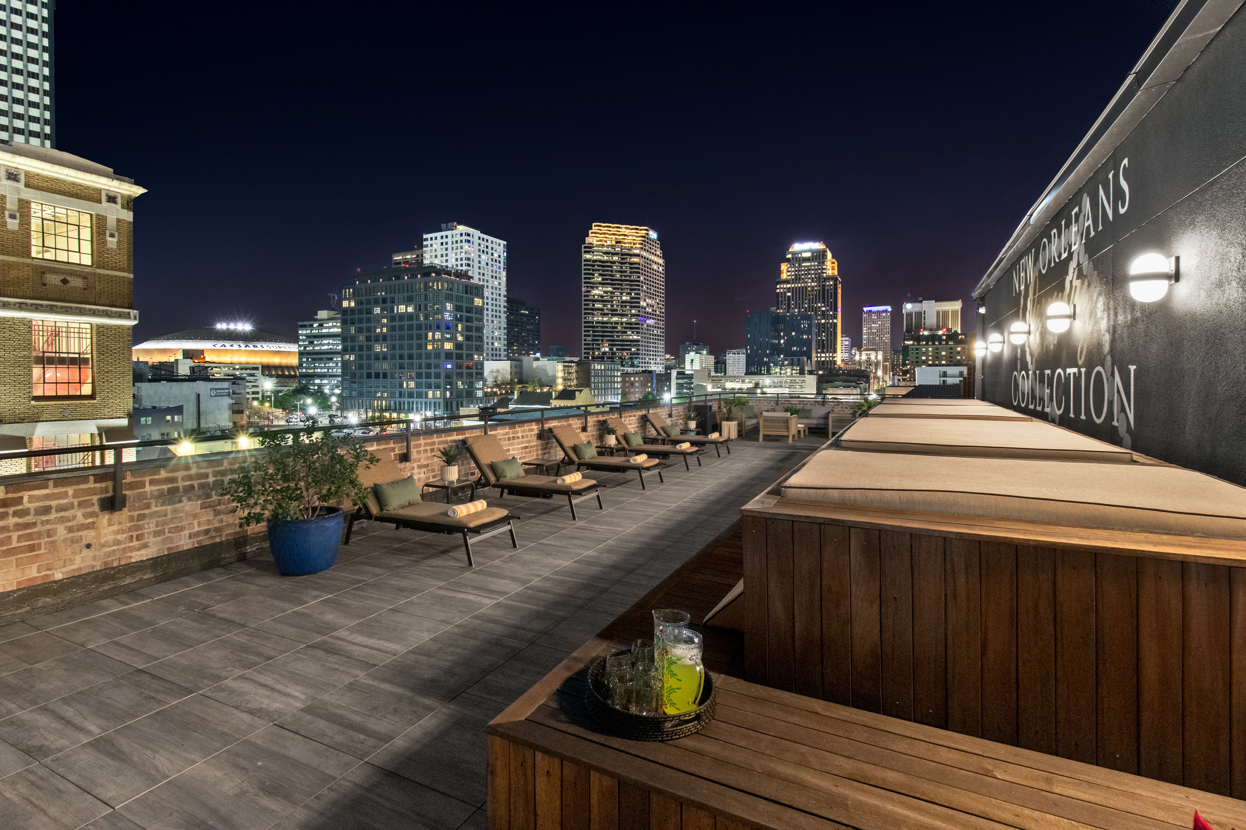 Enjoy the glow of the city lights from our rooftop lounge. With plush loungers, seating and ambient lighting, it's a serene spot to wind down after exploring New Orleans—exclusive to hotel guests at 888 Baronne.