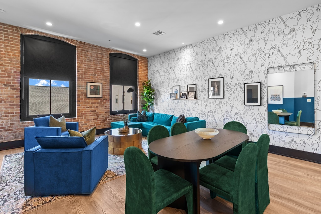 Enjoy meals together at your in-suite dining table with seating for your group. Whether it's takeout, delivery, or a home-cooked meal, this cozy dining area makes every stay at 888 Baronne feel like home in New Orleans.