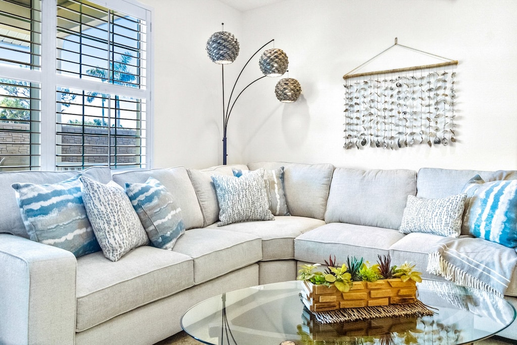 Sink into soft pillows and beachy textures that make this lounge spot a true favorite after a day out.