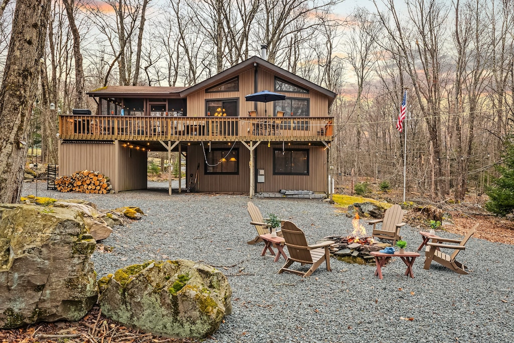 Cozy cabin retreat nestled in the woods—your perfect escape in every season.